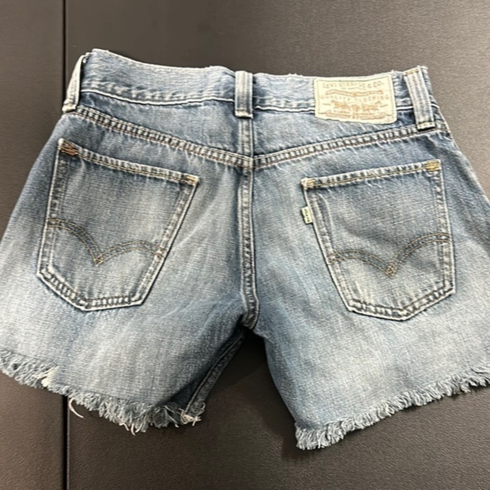 Levi's Women's Blue Frayed and faded Denim Shorts size 30 waist